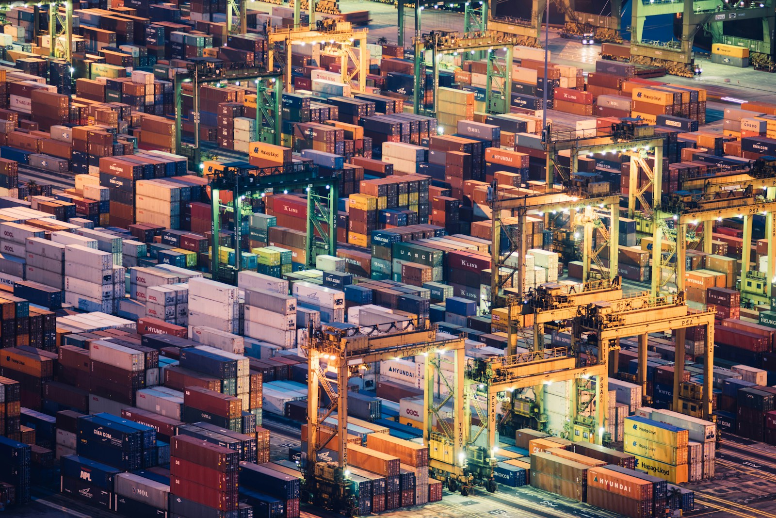 Shipping containers and cranes at a commercial port